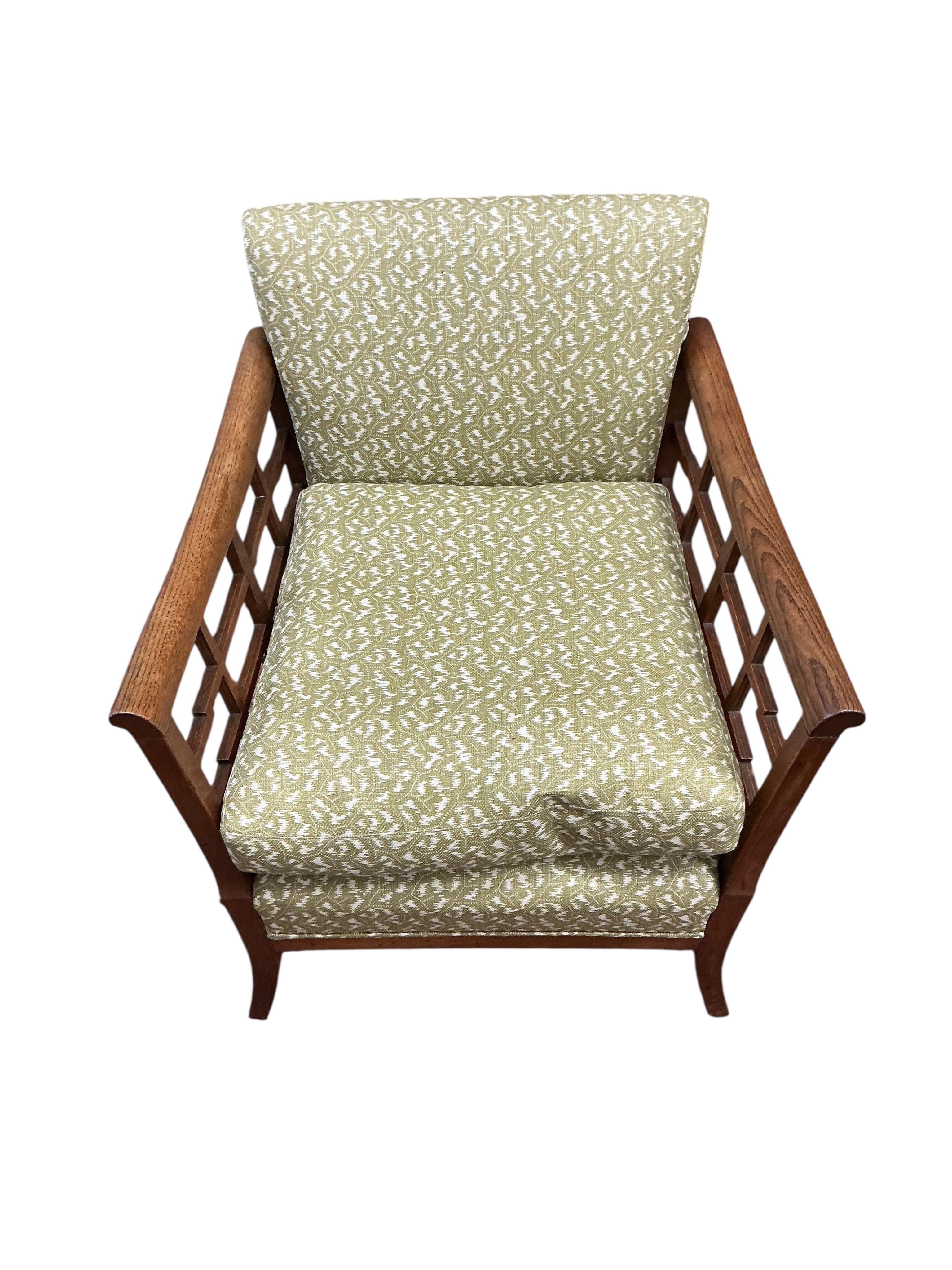 A 1920's oak framed armchair, width 72cm, depth 74cm, height 78cm